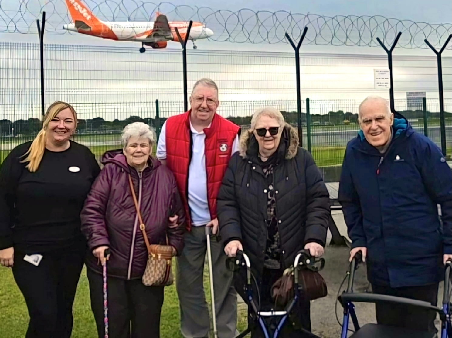 Pictured: Belong Atherton's residents and tenants enjoy plane spotting at Manchester Airport.